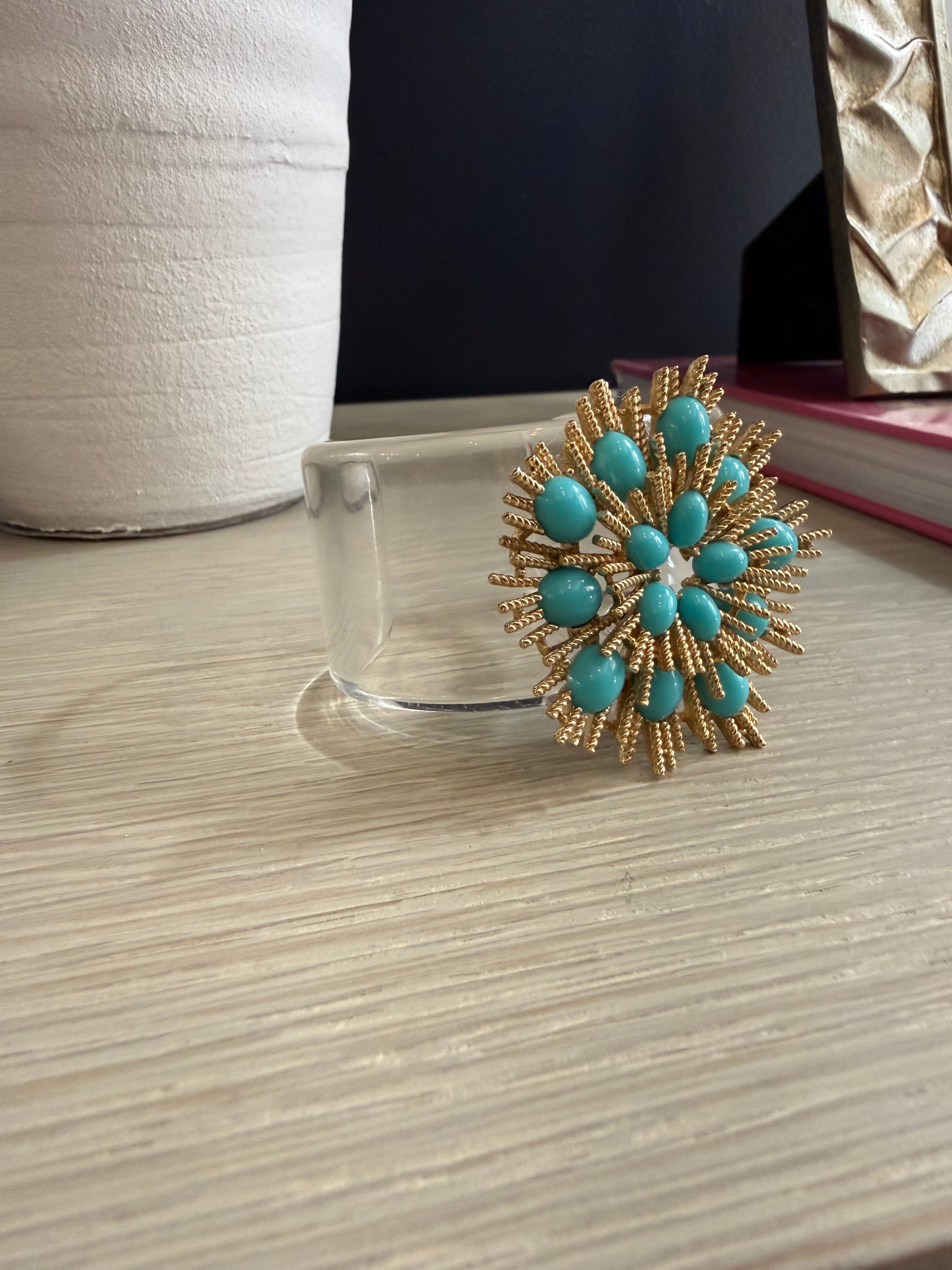 Acrylic cuff with turquoise brooch