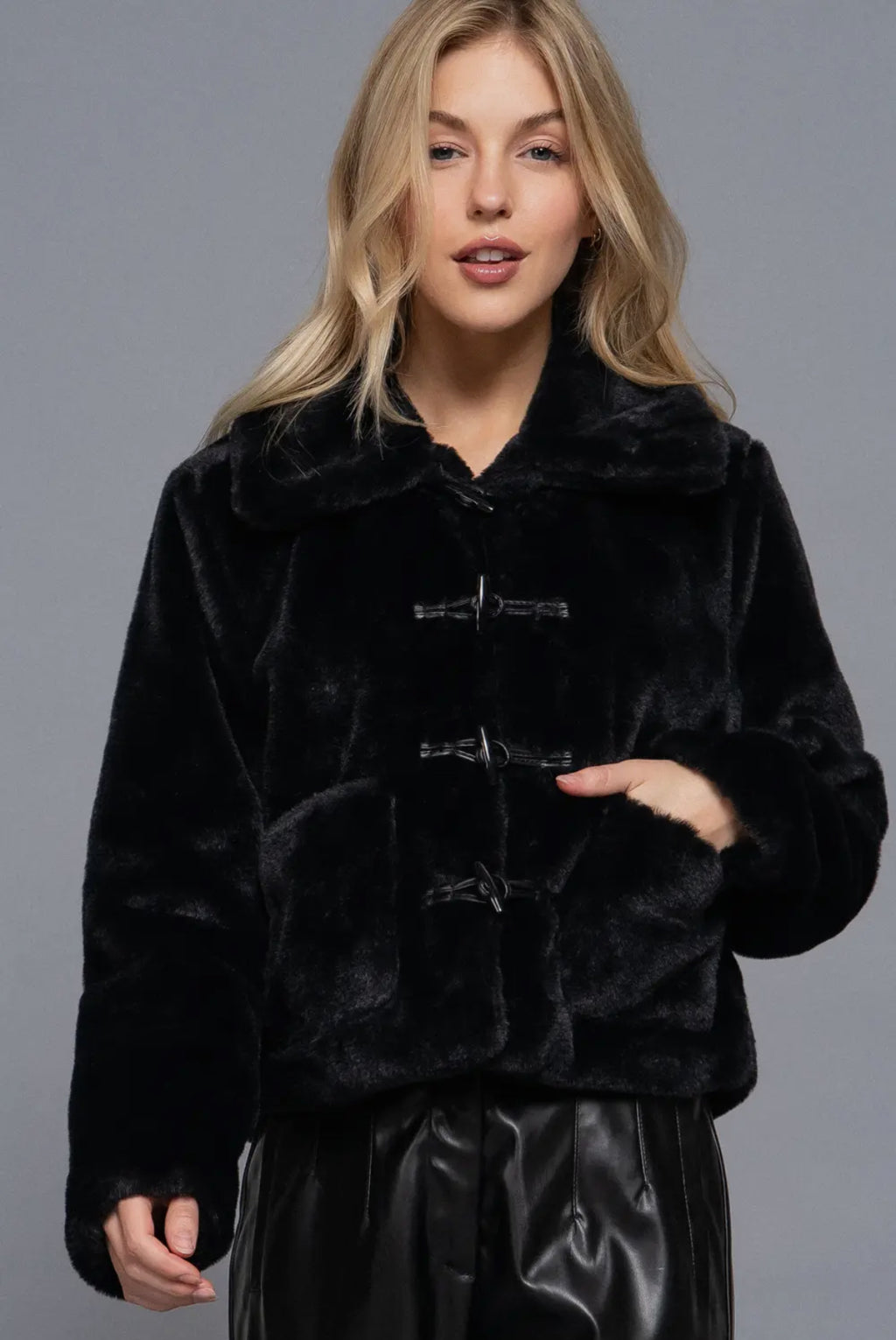 Fur jacket with toggle buttons