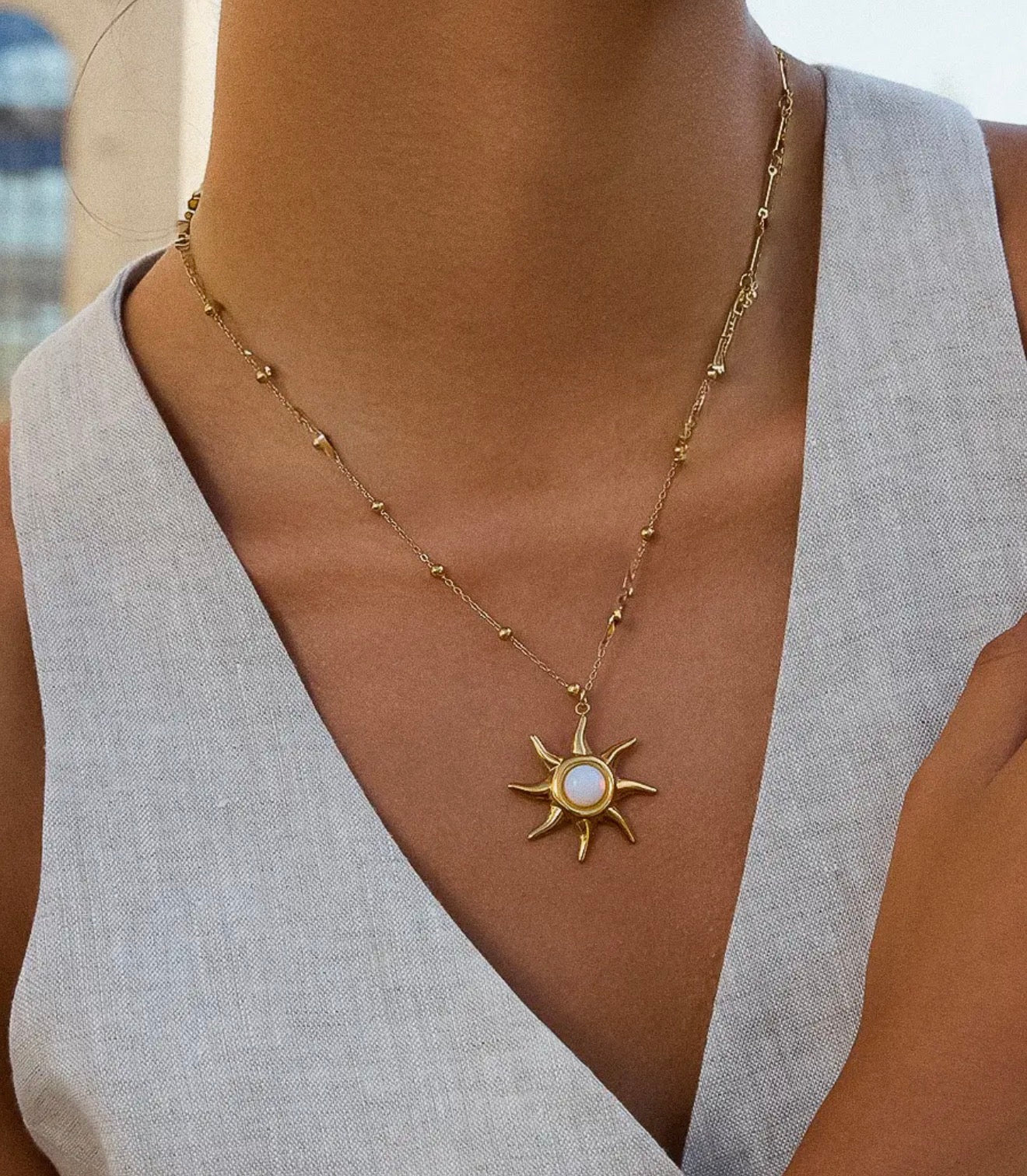 18K opal sun burst necklace