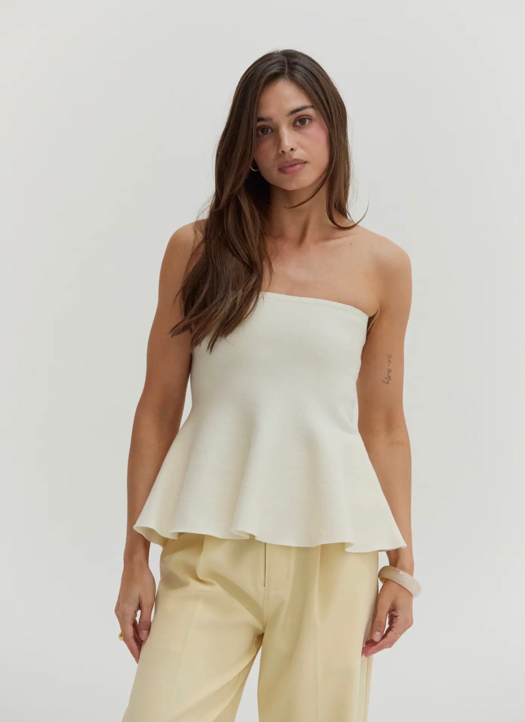 Off white peplum strapless top