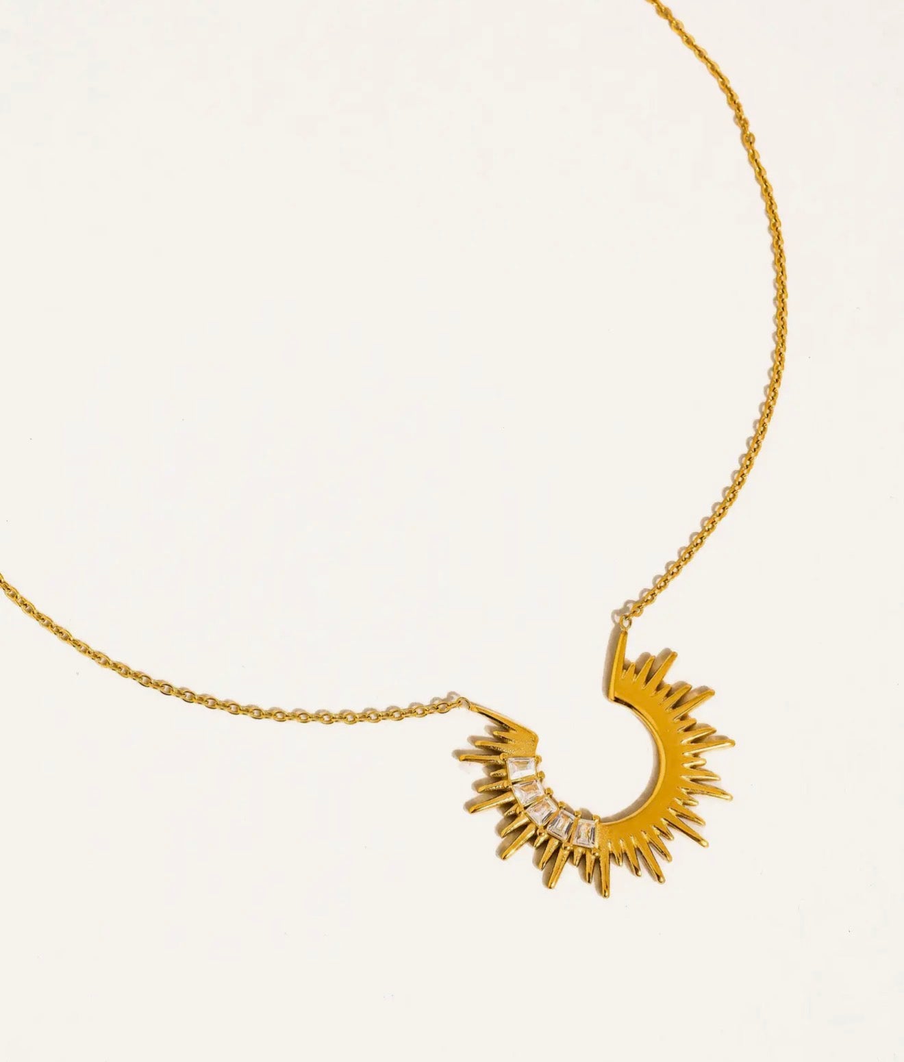 Sunburst with baguette details
