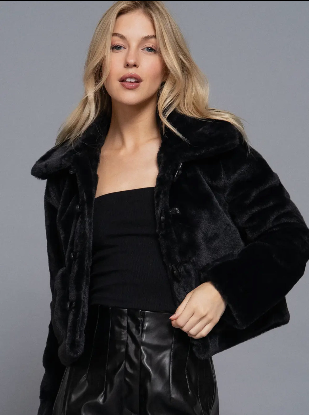 Fur jacket with toggle buttons